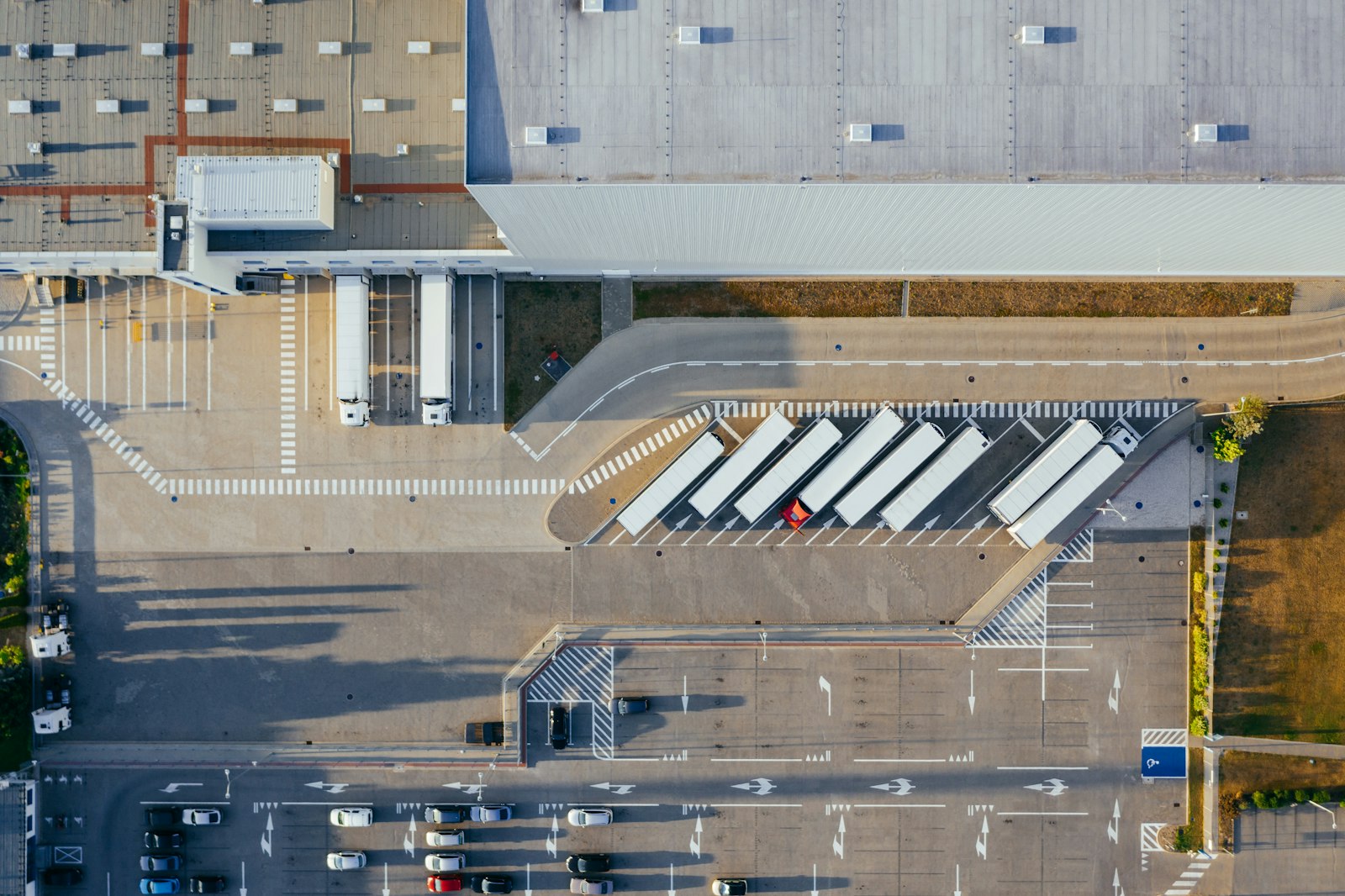 Aerial view of trucks staged at a cross-border distribution yard